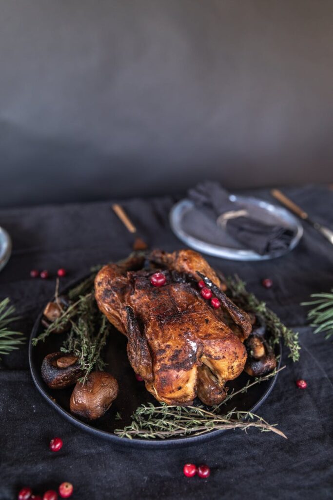 roasted turkey on black ceramic plate
